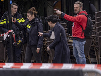 The hostage situation at the Petticoat cafe in Ede, Gelderland, Netherlands, is ending peacefully with the arrest of a suspect. A 28-year-ol...