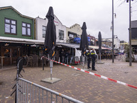 The hostage situation at the Petticoat cafe in Ede, Gelderland, Netherlands, is ending peacefully with the arrest of a suspect. A 28-year-ol...