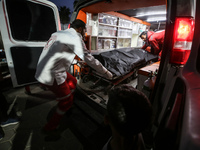 Palestinians are transporting the bodies of employees from the World Central Kitchen (WCK) non-governmental organization, including foreigne...