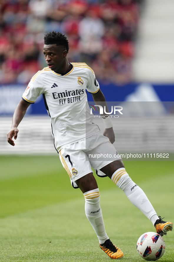 Vinicius Junior left winger of Real Madrid and Brazil controls the ball during the LaLiga EA Sports match between CA Osasuna and Real Madrid...