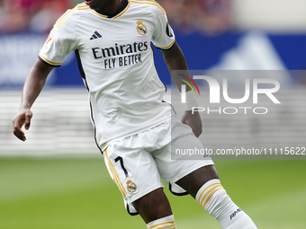 Vinicius Junior left winger of Real Madrid and Brazil controls the ball during the LaLiga EA Sports match between CA Osasuna and Real Madrid...