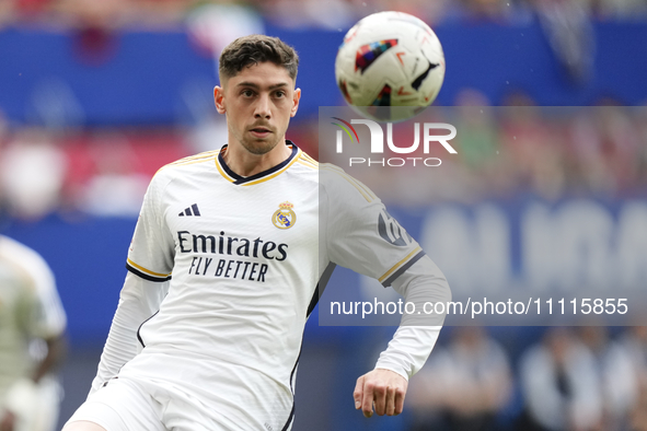 Federico Valverde central midfield of Real Madrid and Uruguay controls the ball during the LaLiga EA Sports match between CA Osasuna and Rea...