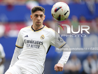 Federico Valverde central midfield of Real Madrid and Uruguay controls the ball during the LaLiga EA Sports match between CA Osasuna and Rea...