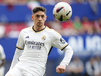 Federico Valverde central midfield of Real Madrid and Uruguay controls the ball during the LaLiga EA Sports match between CA Osasuna and Rea...