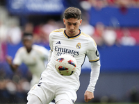 Federico Valverde central midfield of Real Madrid and Uruguay controls the ball during the LaLiga EA Sports match between CA Osasuna and Rea...