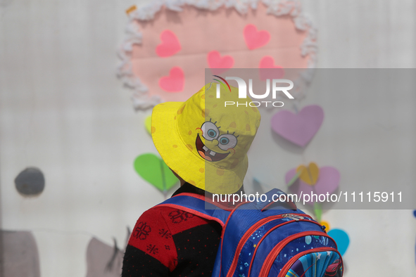 A child is participating in a cultural activity as part of World Autism Awareness Day in Ecatepec, Mexico, on April 2, 2024. 