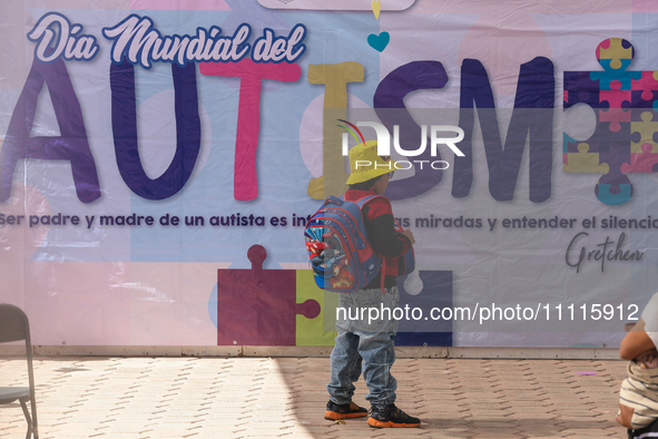 A child is participating in a cultural activity as part of World Autism Awareness Day in Ecatepec, Mexico, on April 2, 2024. 