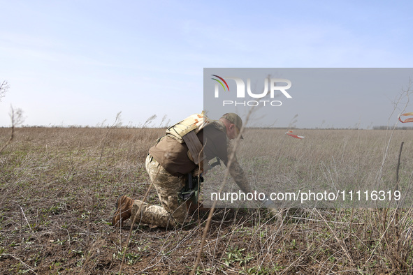 A serviceman is participating in the field tests of the MinesEye unmanned system for the detection of mines and explosive devices as part of...