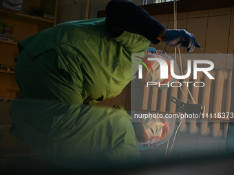 Professor Volodymyr Samaryk, Doctor of Chemical Sciences, is looking into the dehydration furnace during the production of medicinal hydroge...