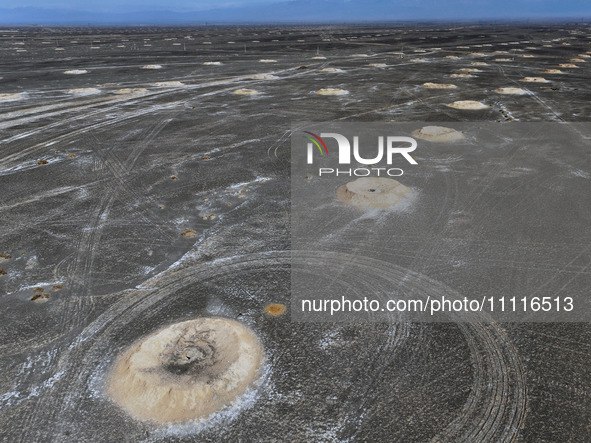 An aerial view is showing Karez, an ancient water project that is using the slope of the ground to extract groundwater without power, in an...