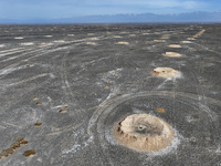 An aerial view is showing Karez, an ancient water project that is using the slope of the ground to extract groundwater without power, in an...