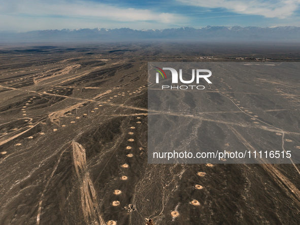 An aerial view is showing Karez, an ancient water project that is using the slope of the ground to extract groundwater without power, in an...