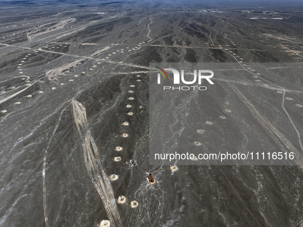 An aerial view is showing Karez, an ancient water project that is using the slope of the ground to extract groundwater without power, in an...