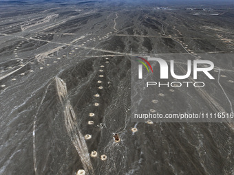 An aerial view is showing Karez, an ancient water project that is using the slope of the ground to extract groundwater without power, in an...