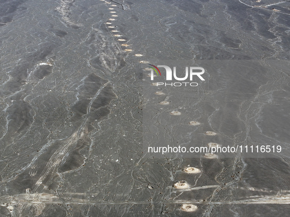 An aerial view is showing Karez, an ancient water project that is using the slope of the ground to extract groundwater without power, in an...