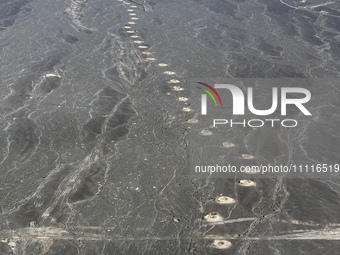 An aerial view is showing Karez, an ancient water project that is using the slope of the ground to extract groundwater without power, in an...