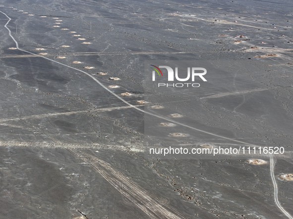 An aerial view is showing Karez, an ancient water project that is using the slope of the ground to extract groundwater without power, in an...