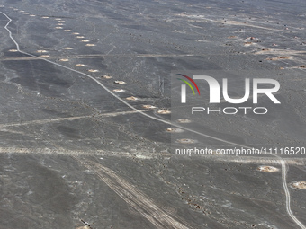 An aerial view is showing Karez, an ancient water project that is using the slope of the ground to extract groundwater without power, in an...