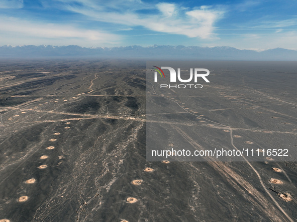 An aerial view is showing Karez, an ancient water project that is using the slope of the ground to extract groundwater without power, in an...