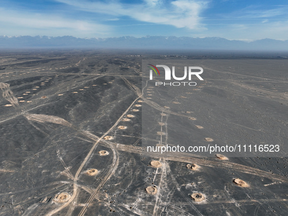 An aerial view is showing Karez, an ancient water project that is using the slope of the ground to extract groundwater without power, in an...