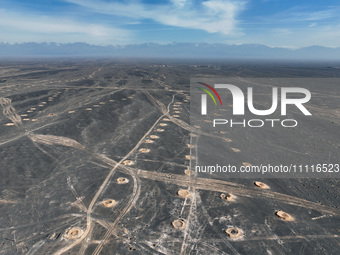 An aerial view is showing Karez, an ancient water project that is using the slope of the ground to extract groundwater without power, in an...