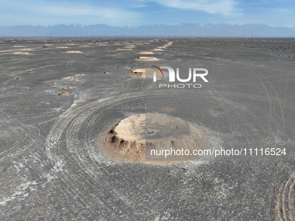 An aerial view is showing Karez, an ancient water project that is using the slope of the ground to extract groundwater without power, in an...