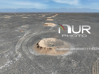 An aerial view is showing Karez, an ancient water project that is using the slope of the ground to extract groundwater without power, in an...