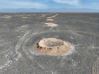 An aerial view is showing Karez, an ancient water project that is using the slope of the ground to extract groundwater without power, in an...