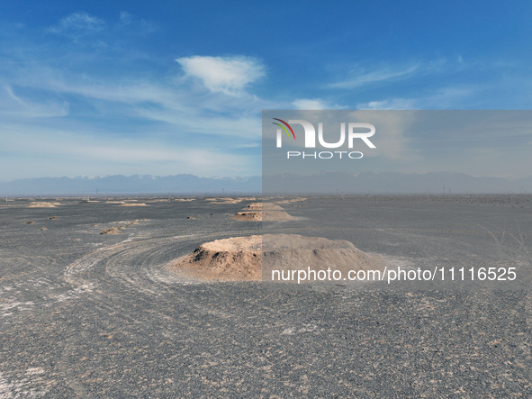 An aerial view is showing Karez, an ancient water project that is using the slope of the ground to extract groundwater without power, in an...