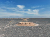 An aerial view is showing Karez, an ancient water project that is using the slope of the ground to extract groundwater without power, in an...