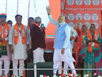 Prime Minister Narendra Modi is showing his support for BJP Jaipur Rural candidate Rao Rajendra Singh during a public meeting ahead of the L...