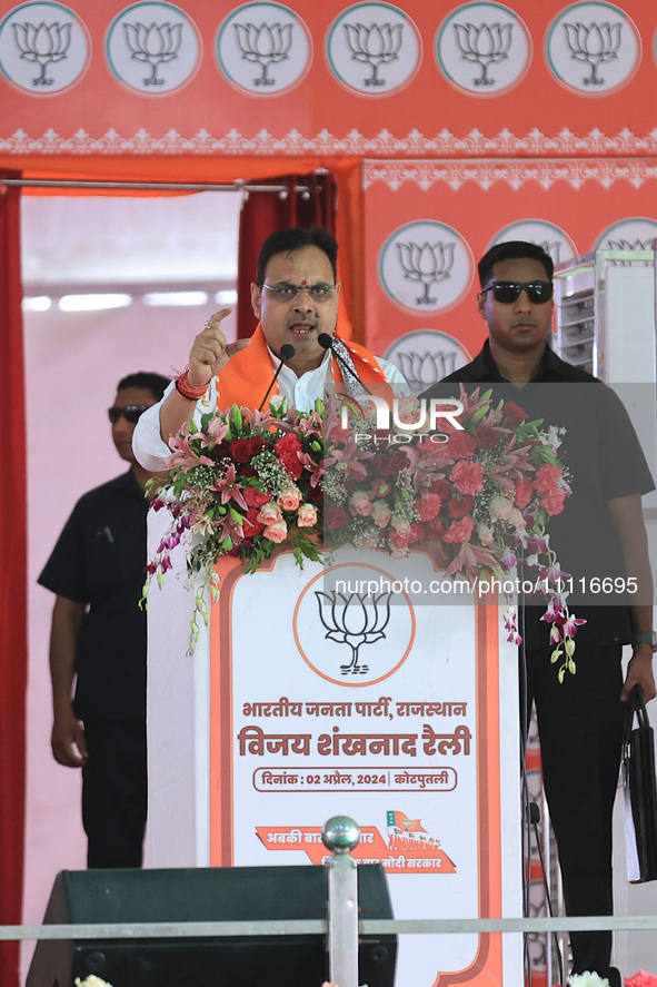 Rajasthan Chief Minister Bhajan Lal Sharma is addressing a public meeting ahead of the Lok Sabha election in Kotputali, Jaipur, Rajasthan, I...