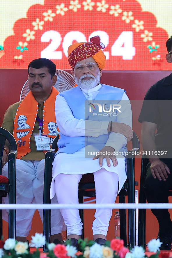 Prime Minister Narendra Modi is speaking at a public meeting ahead of the Lok Sabha election in Kotputali, Jaipur, Rajasthan, India, on Apri...