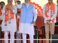 Prime Minister Narendra Modi is with Rajasthan Chief Minister Bhajan Lal Sharma, showing support for BJP Jaipur Rural candidate Rao Rajendra...