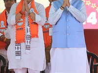 Prime Minister Narendra Modi is with Rajasthan Chief Minister Bhajan Lal Sharma at a public meeting ahead of the Lok Sabha election in Kotpu...