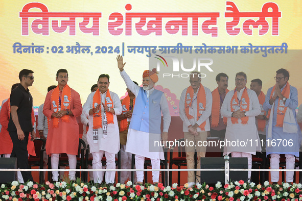 Prime Minister Narendra Modi is with Rajasthan Chief Minister Bhajan Lal Sharma at a public meeting in support of BJP Jaipur Rural candidate...