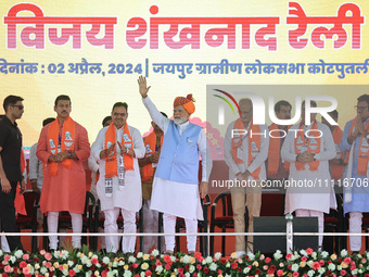 Prime Minister Narendra Modi is with Rajasthan Chief Minister Bhajan Lal Sharma at a public meeting in support of BJP Jaipur Rural candidate...