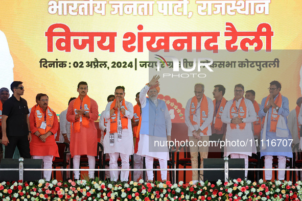 Prime Minister Narendra Modi is with Rajasthan Chief Minister Bhajan Lal Sharma at a public meeting in support of BJP Jaipur Rural candidate...