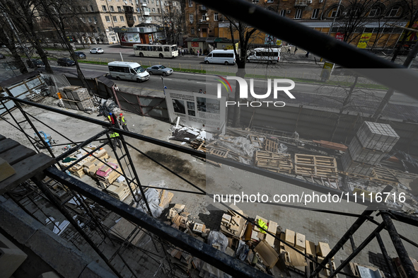 Restoration work is underway at a building partially destroyed by a Russian missile strike in Zaporizhzhia, southeastern Ukraine, on April 2...