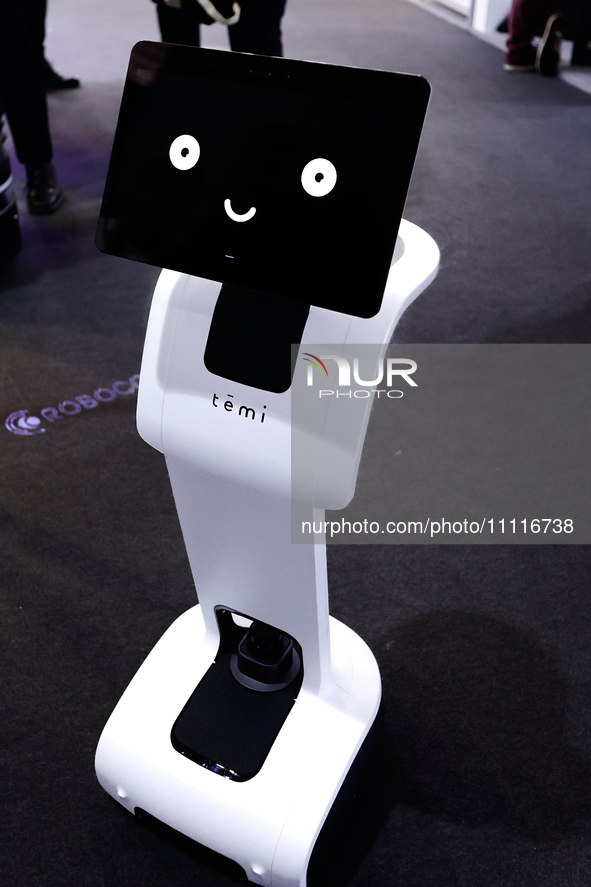 A smiling Temi 3, a video-oriented personal AI assistant robot designed by the Chinese company Temi and owned by Robocore, is being showcase...