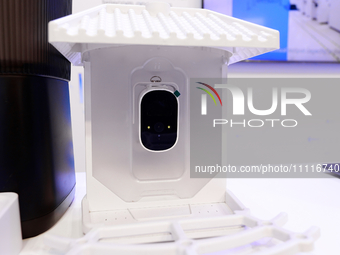A bird feeder equipped with a camera and artificial intelligence, developed by the Chinese technology manufacturer JFTECH, is on display at...