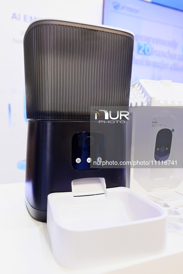 A cat and dog feeder equipped with a camera and artificial intelligence is being exhibited by the Chinese technology manufacturer JFTECH at...