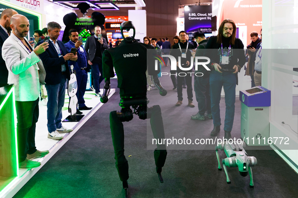 The Unitree H1, the first humanoid robot by the Chinese robotics company, and the Unitree Go2, a quadruped dog-inspired robot, are being par...