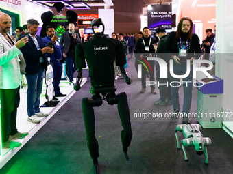 The Unitree H1, the first humanoid robot by the Chinese robotics company, and the Unitree Go2, a quadruped dog-inspired robot, are being par...