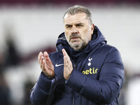 Ange Postecoglou, the manager of Tottenham Hotspur, is standing at the end of the game during the Premier League match between West Ham Unit...