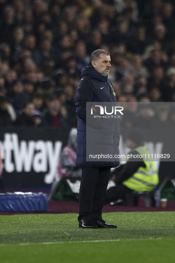 Ange Postecoglou is managing Tottenham Hotspur from the touchline during the Premier League match between West Ham United and Tottenham Hots...