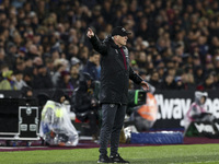 David Moyes, manager of West Ham United, is standing on the touchline during the Premier League match between West Ham United and Tottenham...