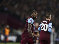 Michail Antonio of West Ham United is playing during the Premier League match between West Ham United and Tottenham Hotspur at the London St...