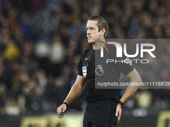 Match referee John Brooks is officiating the Premier League match between West Ham United and Tottenham Hotspur at the London Stadium in Str...