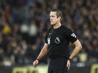 Match referee John Brooks is officiating the Premier League match between West Ham United and Tottenham Hotspur at the London Stadium in Str...